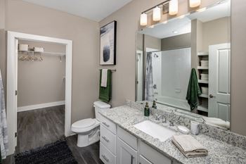 our apartments offer a bathroom with a shower at Fairview Springs in Covington, GA, 30016